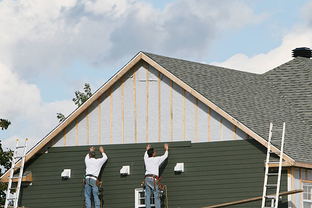 Professional Siding Replacement technician working in East Islip, NY